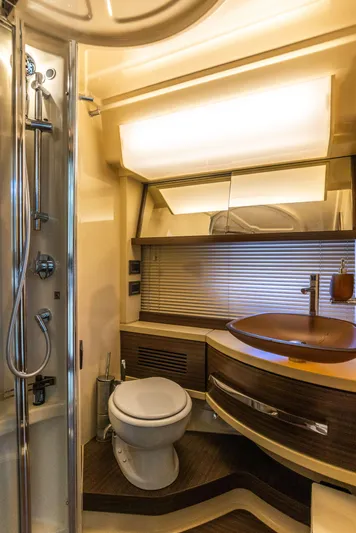 Prime Time II Yacht Photos Pics Luxurious bathroom in 2016 Azimut 64 Flybridge yacht with modern fixtures and elegant design.
