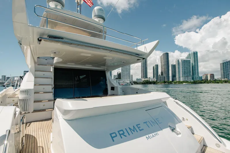Prime Time II Yacht Photos Pics 2016 Azimut 64 Flybridge yacht docked with city skyline in background.
