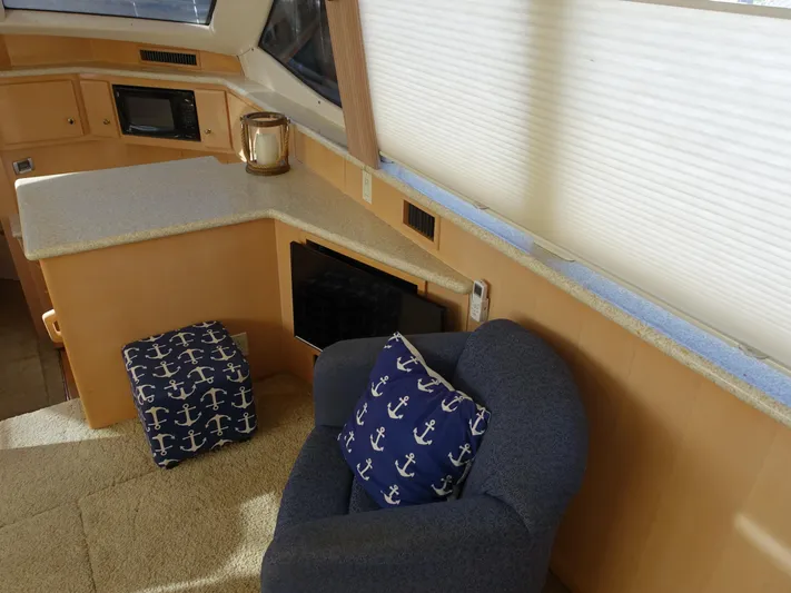  Yacht Photos Pics Interior of 2000 Carver 406 Aft Cabin Motor Yacht with nautical-themed decor.