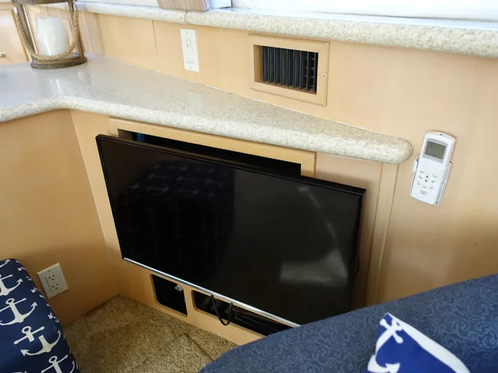 Yacht Photos Pics Flat-screen TV in 2000 Carver 406 Aft Cabin Motor Yacht interior.