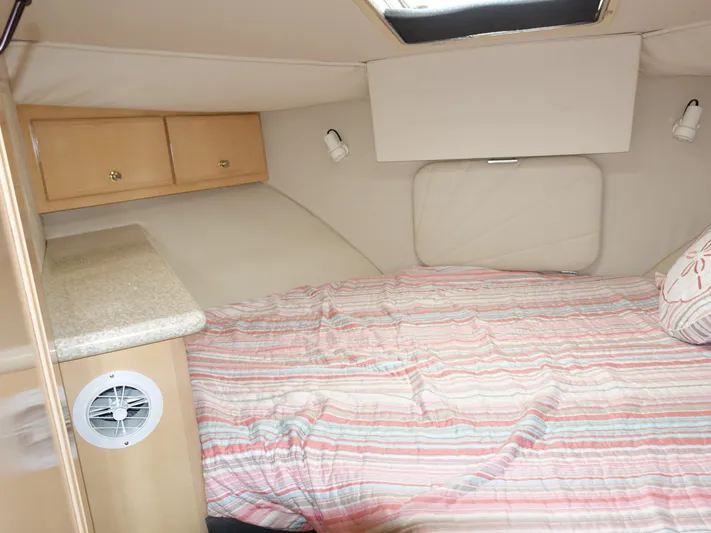  Yacht Photos Pics Interior cabin of 2000 Carver 406 Aft Cabin Motor Yacht with bed and storage.