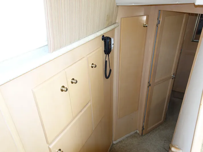  Yacht Photos Pics Interior hallway of 2000 Carver 406 Aft Cabin Motor Yacht with wood cabinets.
