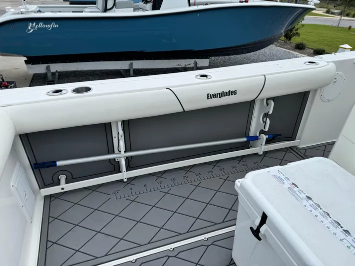  Yacht Photos Pics 2008 Everglades 320CC boat interior with rod holders and storage compartments.