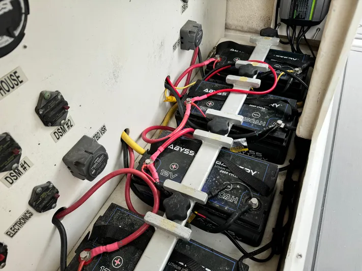  Yacht Photos Pics Battery compartment of a 2008 Everglades 320CC boat with wiring and connections.