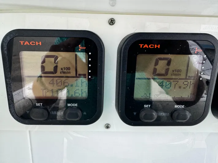  Yacht Photos Pics Close-up of dual Yamaha tachometers on a 2008 Everglades 320CC boat dashboard.
