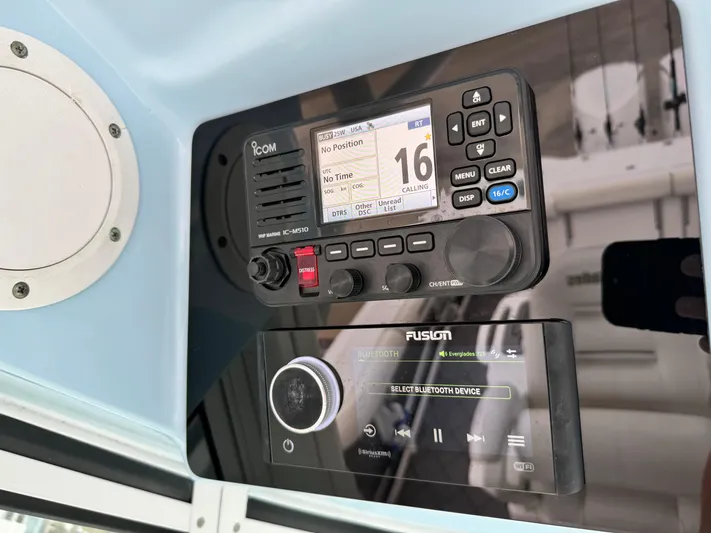  Yacht Photos Pics Boat electronics panel with Icom radio and Fusion audio system, Everglades 320CC, 2008 model.