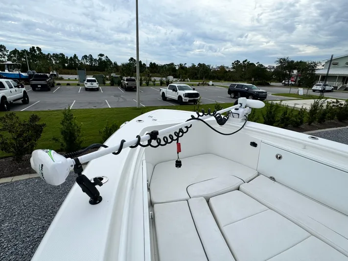  Yacht Photos Pics 2008 Everglades 320CC boat with trolling motor in parking lot.