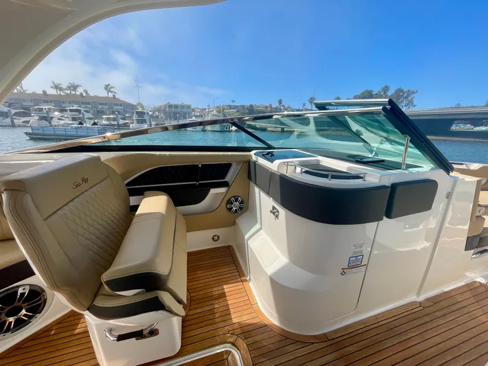 Honey Yacht Photos Pics 2019 Sea Ray SLX 310 boat interior with luxurious seating and sleek design.