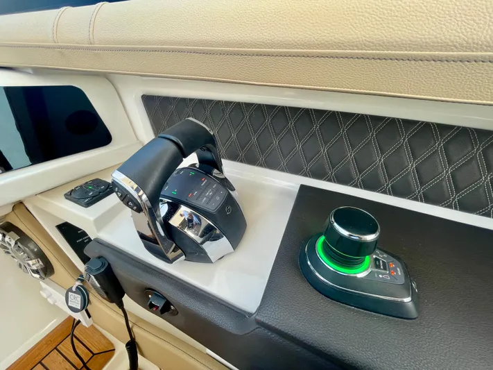 Honey Yacht Photos Pics 2019 Sea Ray SLX 310 boat controls with joystick and throttle, featuring modern design and technology.
