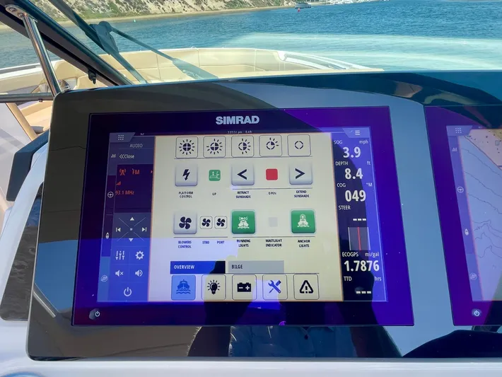 Honey Yacht Photos Pics Simrad display on 2019 Sea Ray SLX 310 boat, showing navigation and control interface.