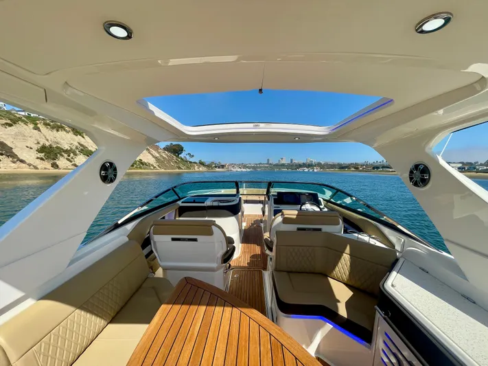 Honey Yacht Photos Pics Luxurious 2019 Sea Ray SLX 310 boat interior with scenic water view.