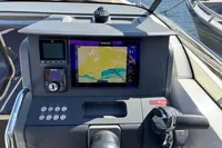 Control panel of a 2020 Nimbus T8 boat with navigation display and controls.