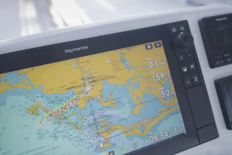 Bellissima Yacht Photos Pics Raymarine navigation display on 2024 Lagoon 51 yacht, showing nautical chart and data.