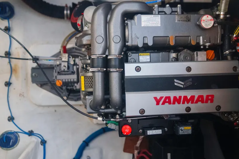 Bellissima Yacht Photos Pics Engine compartment of a 2024 Lagoon 51 yacht featuring a Yanmar engine.
