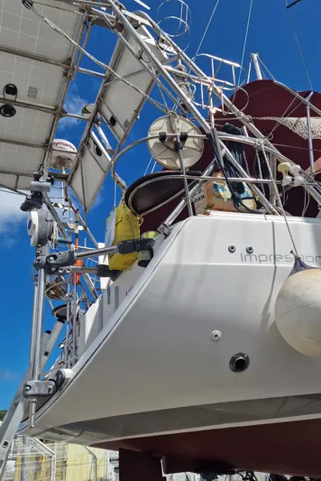  Yacht Photos Pics 2007 Elan Impression 434 yacht with solar panels and rigging against a clear blue sky.