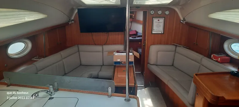  Yacht Photos Pics Interior of 2007 Elan Impression 434 yacht with cozy seating and modern amenities.