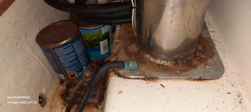  Yacht Photos Pics Rusty boat compartment with cans and cables, Elan Impression 434, 2007 model.