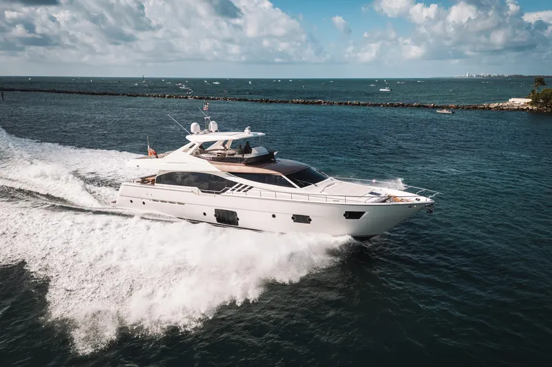 Lady Nelly Yacht Photos Pics Luxurious 2014 Ferretti Yachts 870 cruising on open water under a clear sky.