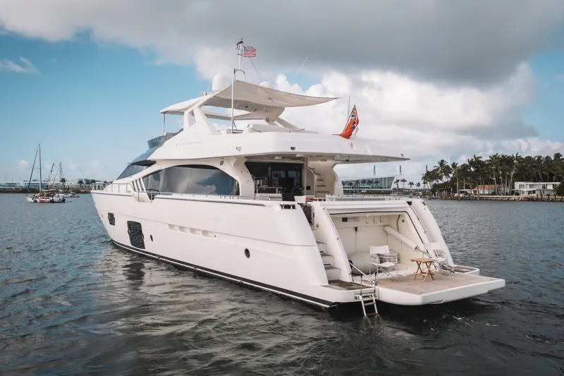 Lady Nelly Yacht Photos Pics Luxurious 2014 Ferretti Yachts 870 on serene waters, showcasing elegant design and spacious deck.