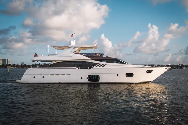 Lady Nelly Yacht Photos Pics Luxurious 2014 Ferretti Yachts 870 cruising on calm waters under a partly cloudy sky.