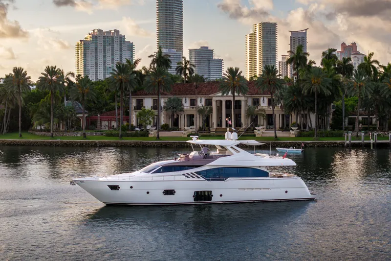 Lady Nelly Yacht Photos Pics Luxurious 2014 Ferretti Yachts 870 cruising near waterfront mansion and city skyline.
