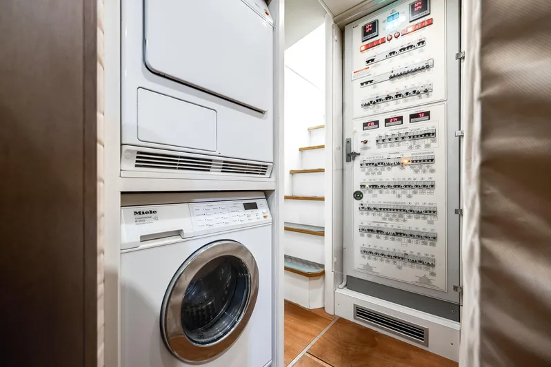 Lady Nelly Yacht Photos Pics Laundry area and control panel inside a 2014 Ferretti Yachts 870.