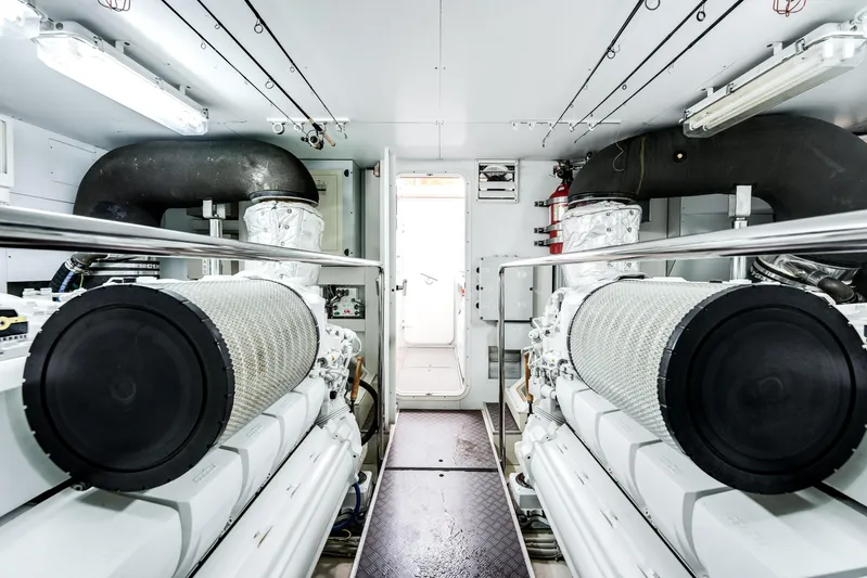 Lady Nelly Yacht Photos Pics Engine room of 2014 Ferretti Yachts 870, featuring dual engines and modern equipment.