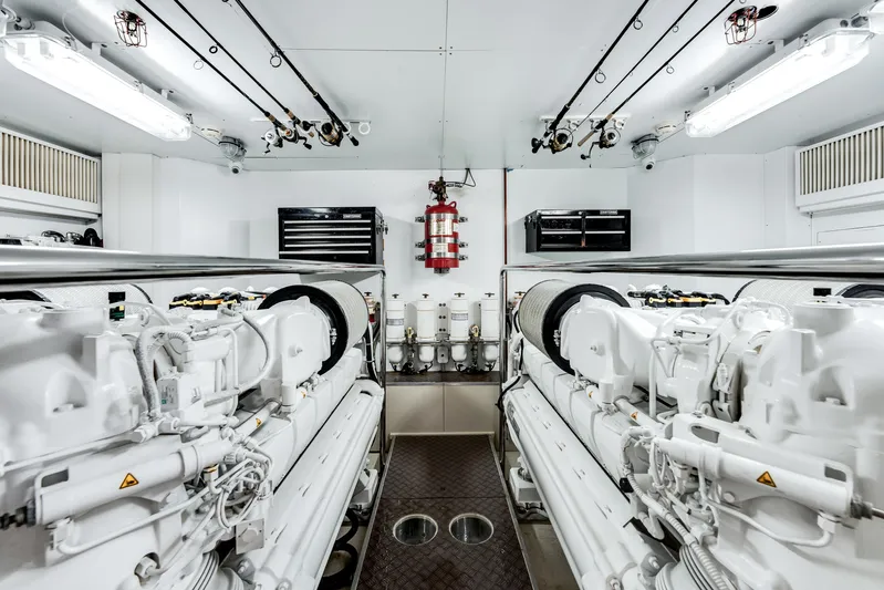 Lady Nelly Yacht Photos Pics Engine room of 2014 Ferretti Yachts 870, featuring dual engines and modern equipment.