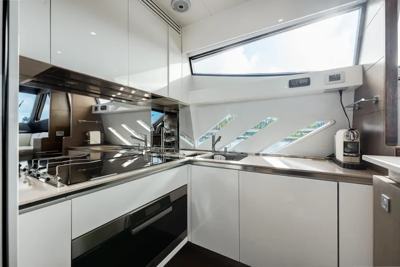 Lady Nelly Yacht Photos Pics Modern kitchen interior of 2014 Ferretti Yachts 870 with sleek design and large windows.