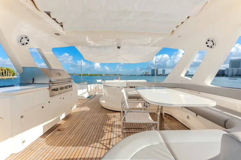 Lady Nelly Yacht Photos Pics Luxurious 2014 Ferretti Yachts 870 deck with dining area and ocean view.