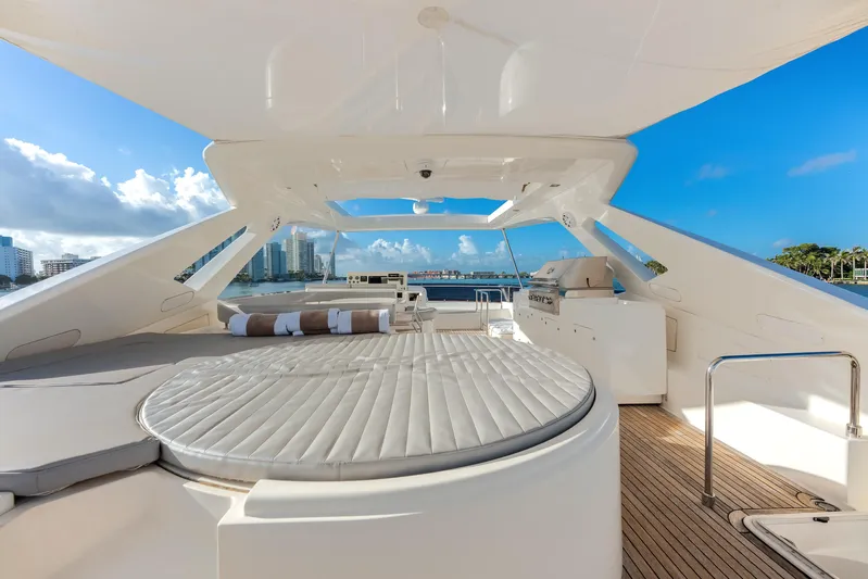 Lady Nelly Yacht Photos Pics Luxurious 2014 Ferretti Yachts 870 deck with sunbathing area and stunning ocean views.