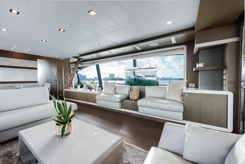Lady Nelly Yacht Photos Pics Luxurious interior of 2014 Ferretti Yachts 870 with modern decor and large windows.