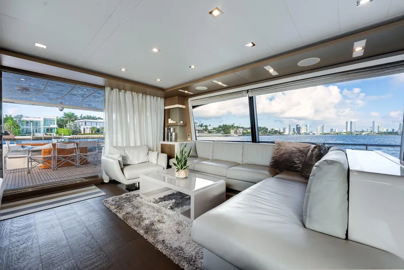 Lady Nelly Yacht Photos Pics Luxurious interior of 2014 Ferretti Yachts 870 with waterfront view and elegant furnishings.