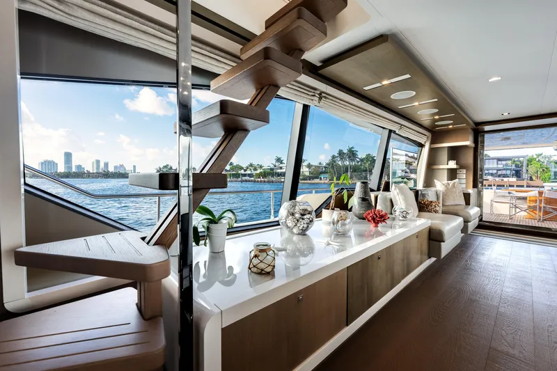 Lady Nelly Yacht Photos Pics Luxurious interior of 2014 Ferretti Yachts 870 with modern decor and waterfront view.