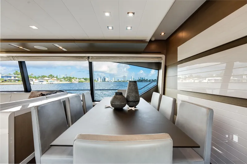 Lady Nelly Yacht Photos Pics Luxurious dining area on 2014 Ferretti Yachts 870 with scenic ocean view.