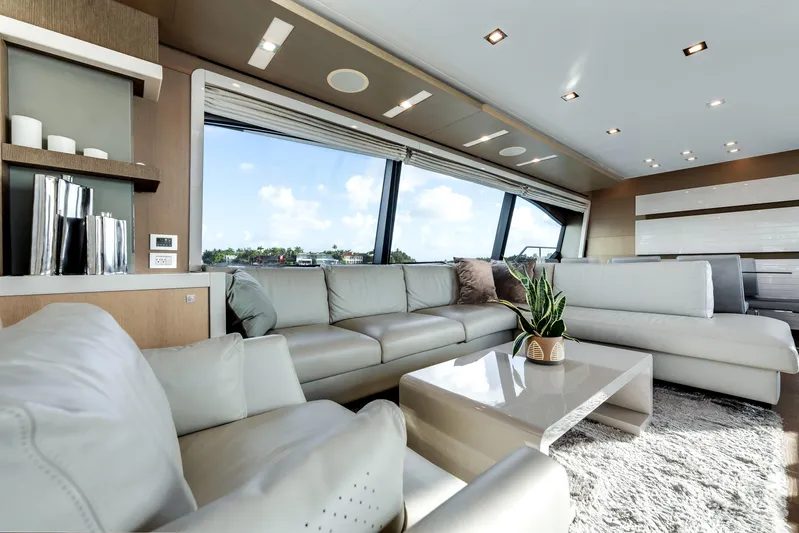 Lady Nelly Yacht Photos Pics Luxurious interior of 2014 Ferretti Yachts 870 with modern furnishings and panoramic windows.
