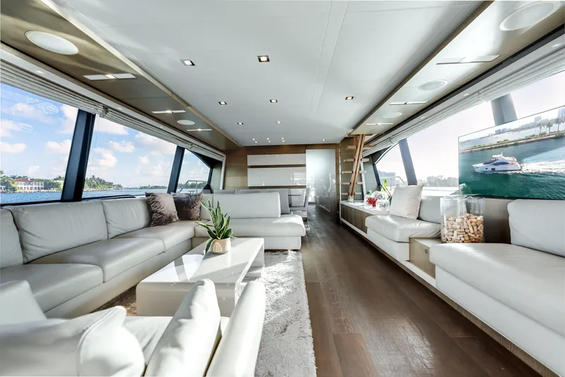 Lady Nelly Yacht Photos Pics Luxurious interior of 2014 Ferretti Yachts 870 with elegant white seating and panoramic windows.