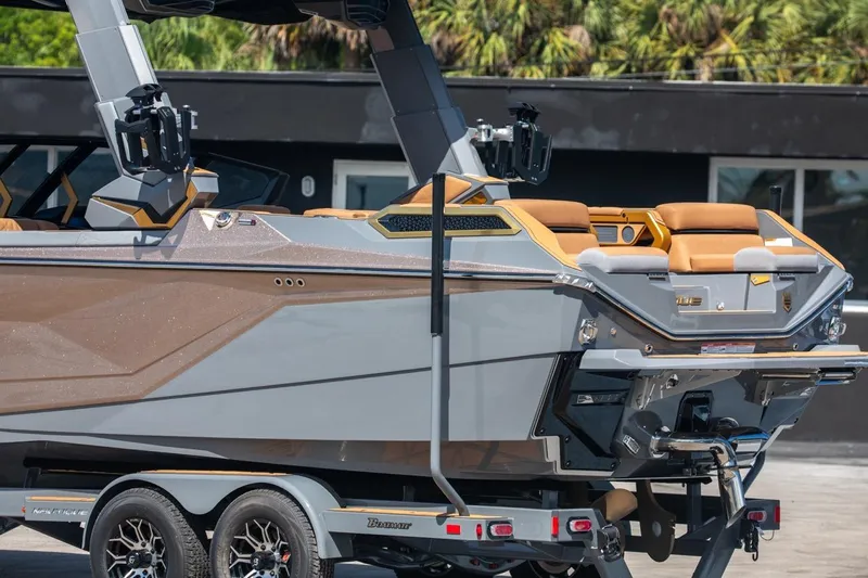  Yacht Photos Pics 2024 Nautique Super Air Nautique G23 Paragon boat with sleek design and luxurious seating.