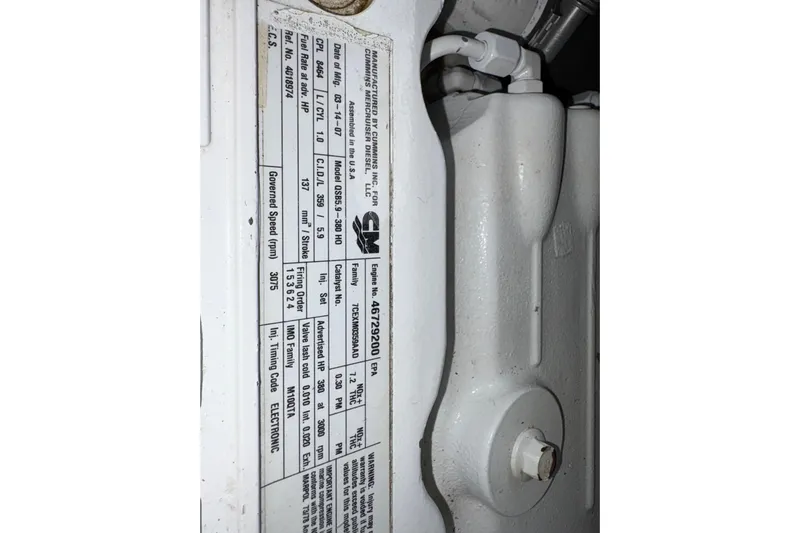  Yacht Photos Pics Engine specifications label on a 2008 Sea Ray 40 Sundancer boat.