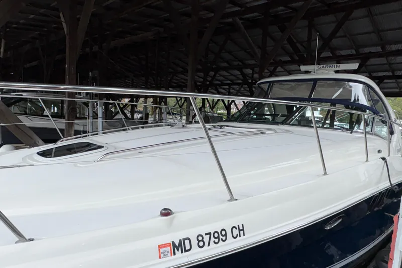  Yacht Photos Pics 2008 Sea Ray 40 Sundancer yacht docked in a covered marina.