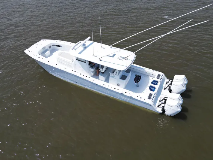  Yacht Photos Pics Freeman 43 boat, 2024 model, cruising on calm waters, aerial view.