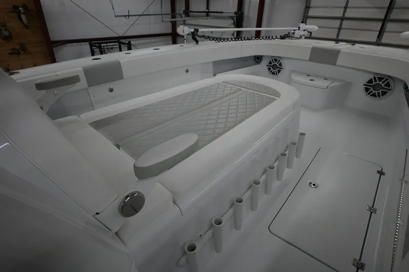  Yacht Photos Pics 2024 Freeman 43 boat interior with seating, rod holders, and storage compartments.