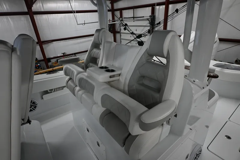  Yacht Photos Pics Luxury seating on a 2024 Freeman 43 boat, featuring plush, ergonomic design in a sleek interior.