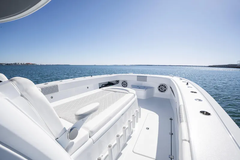  Yacht Photos Pics 2024 Freeman 43 boat interior with luxurious seating on open water.