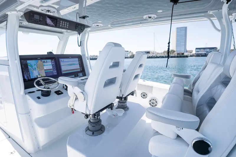  Yacht Photos Pics 2024 Freeman 43 boat interior with modern navigation system and luxurious seating.