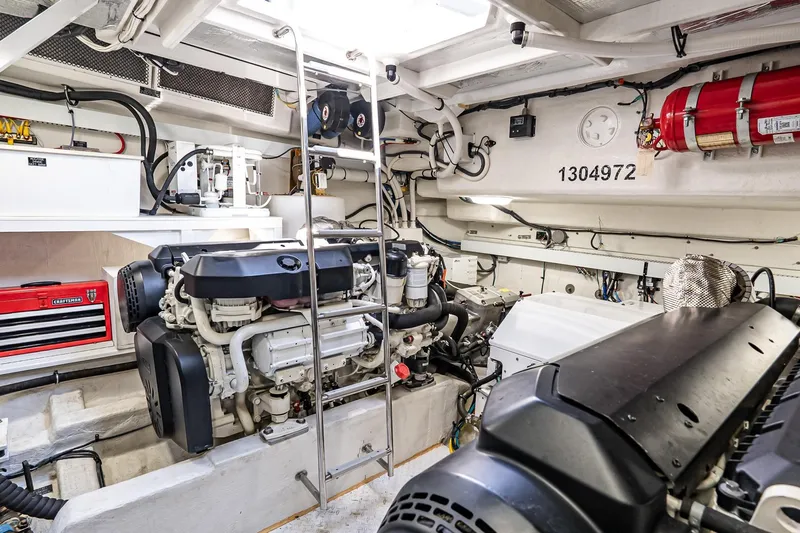My Way Yacht Photos Pics Engine room of 2019 Cruisers Yachts 54 Cantius, featuring dual engines and equipment.