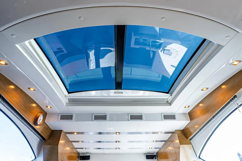 My Way Yacht Photos Pics Interior view of 2019 Cruisers Yachts 54 Cantius with skylight and modern lighting.