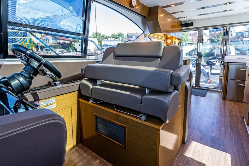 My Way Yacht Photos Pics Interior of 2019 Cruisers Yachts 54 Cantius with modern helm and seating.