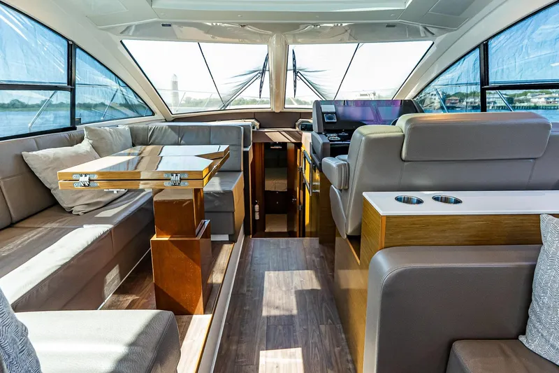 My Way Yacht Photos Pics Luxurious interior of 2019 Cruisers Yachts 54 Cantius with elegant seating and modern design.