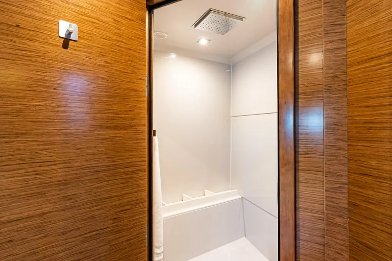 My Way Yacht Photos Pics Luxurious shower area in 2019 Cruisers Yachts 54 Cantius with wood paneling.
